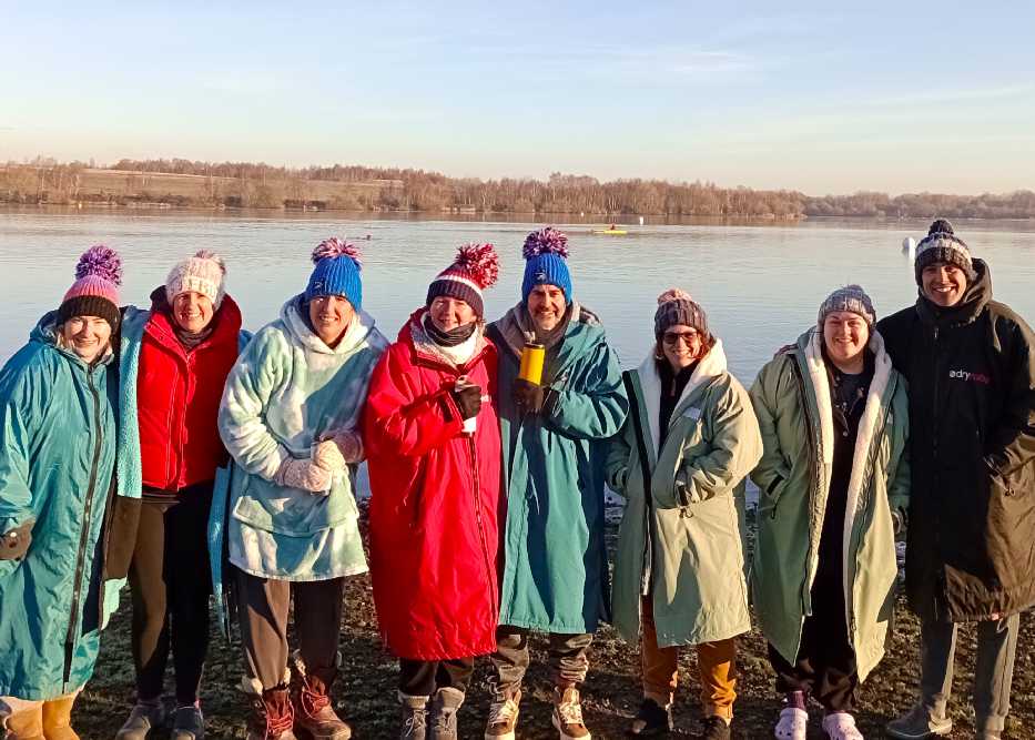 Group of swimmers, warming up after a sub 10 swim, on a fresh winters morning
